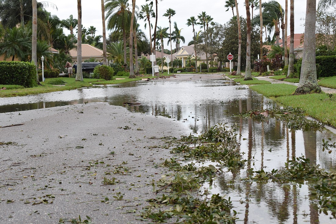 Manatee County officials warn that a predicted tropical storm could cause flooding in some areas on Sunday.