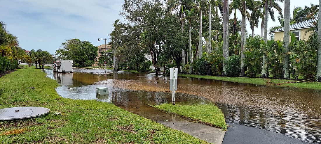 General Harris Street by Christ Church of Longboat Key after Hurricane Debby at high tide around 1:30 p.m. on Aug. 5.