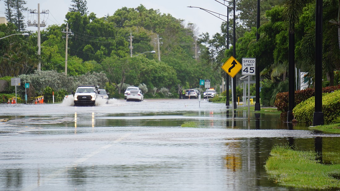 Water made the road nearly impossible around the 4700 block of Gulf of Mexico Drive.