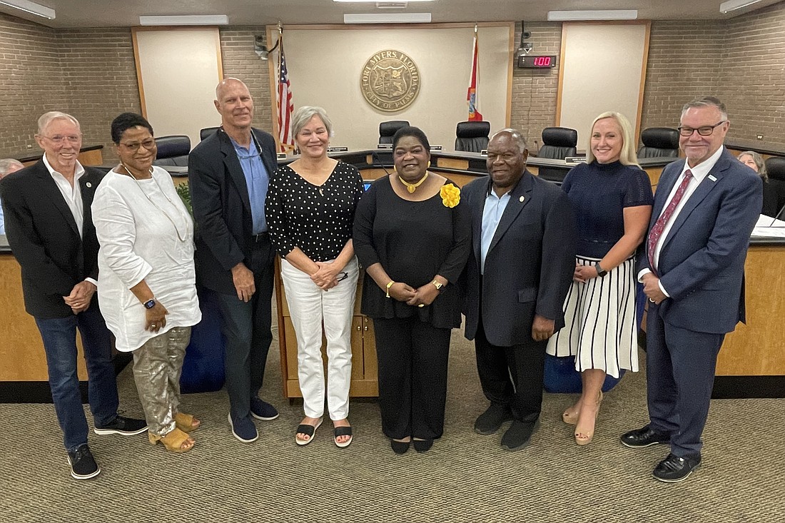 Deborah Gillen (center) with the Fort Muyers CRA Commissioners and Executive Director Michele Hylton-Terry.