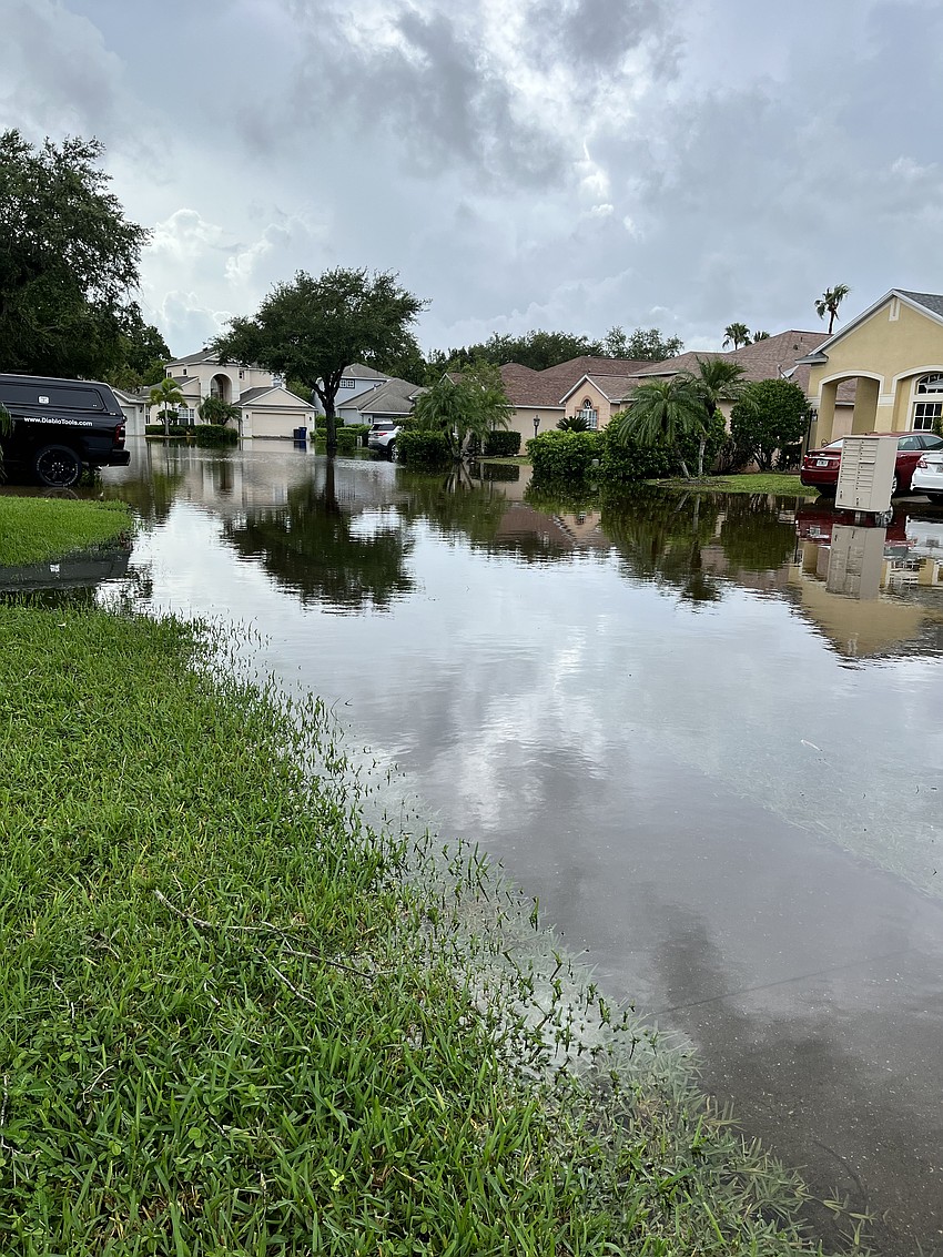 Waterpoppy Terrace in Riverwalk is under water. Residents say the water rose throughout the day on Aug. 5.