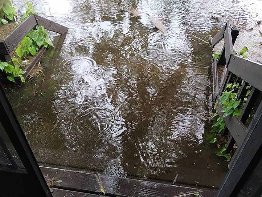 The water almost reaches the patio of the Linger Lodge Restaurant.