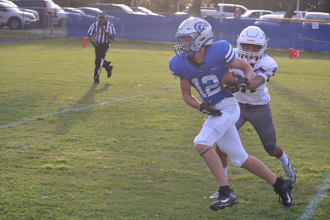 Sarasota Christian School wide receiver Travis Miller (12) led the team in receiving yards in 2023 with 545.