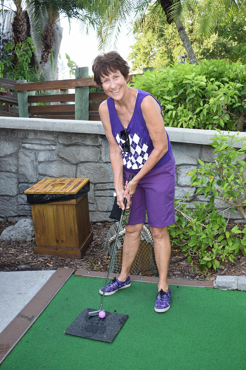 Lakewood Ranch's Mollie Saia matches her outfit to her MVP Sports and Social mini golf league shirt.