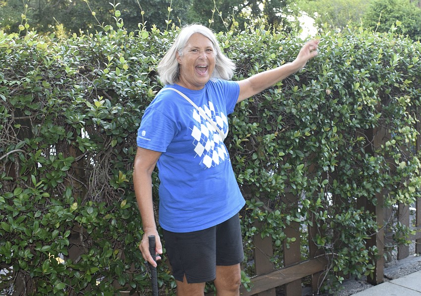 Lakewood Ranch's Jean Hubbard screams and jumps around to celebrate her husband John Hubbard's hole-in-one.