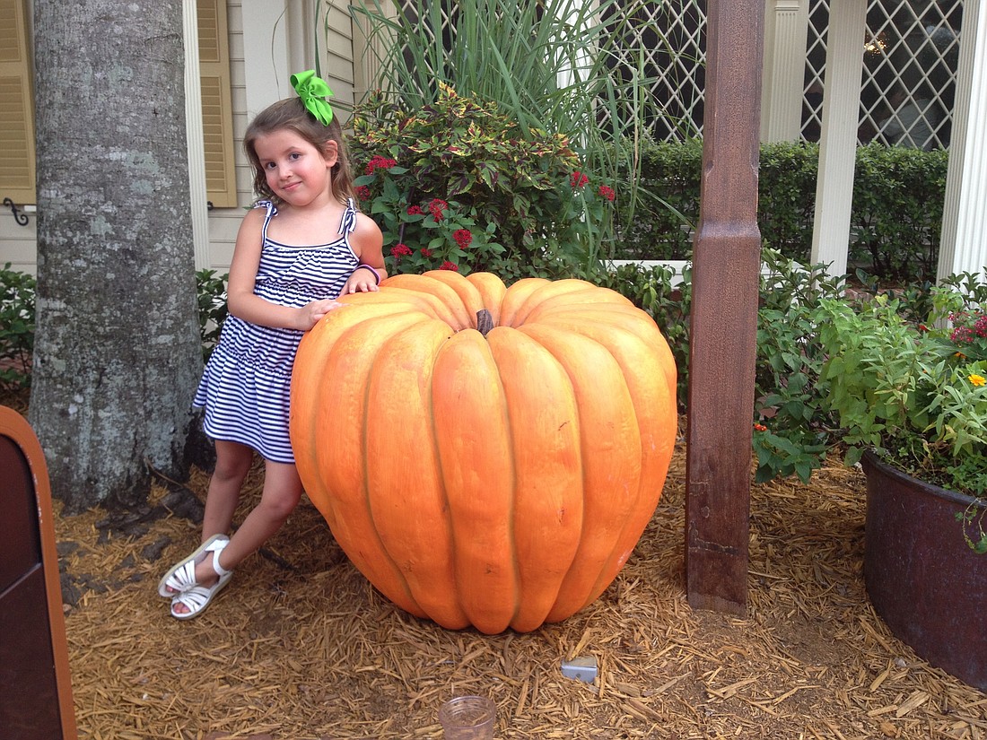 A young Lily Parker found the largest pumpkin.