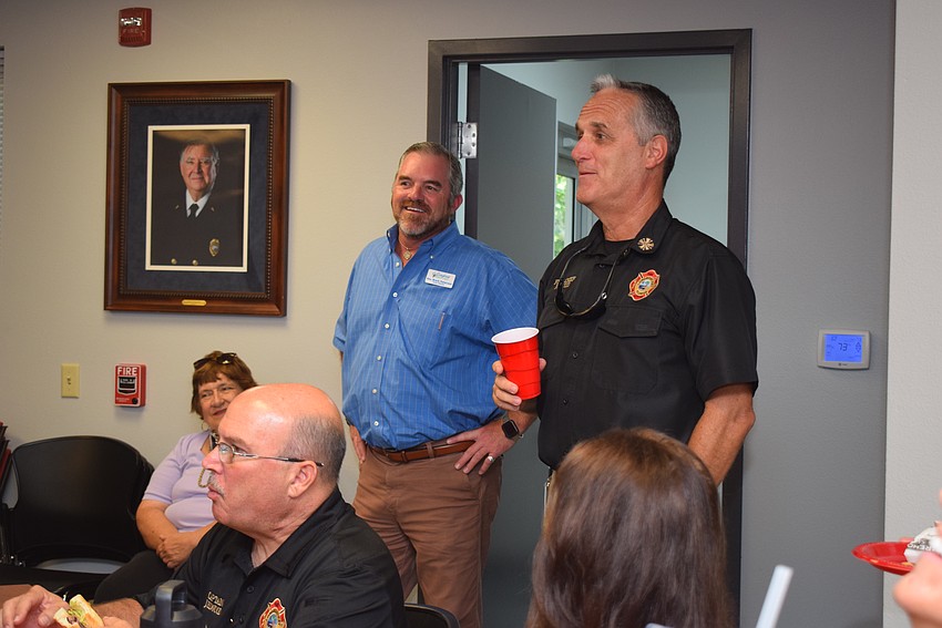 The Rev. Brock Patterson and Fire Chief Paul Dezzi