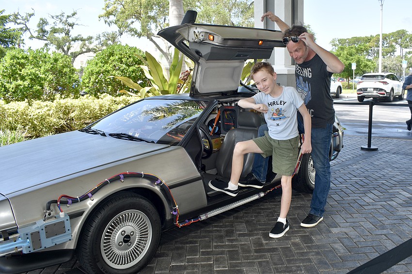 Max Nordstrom, 10, and Mark Nordstrom recreate the poster of 