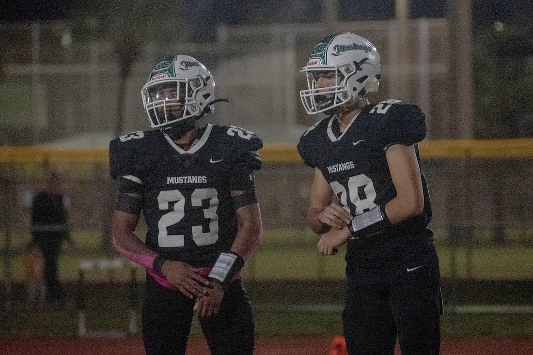 Lakewood Ranch High running back Cullen McRae (23) and quarterback Liam Fernandez (28) will both get chances to shine in 2024.