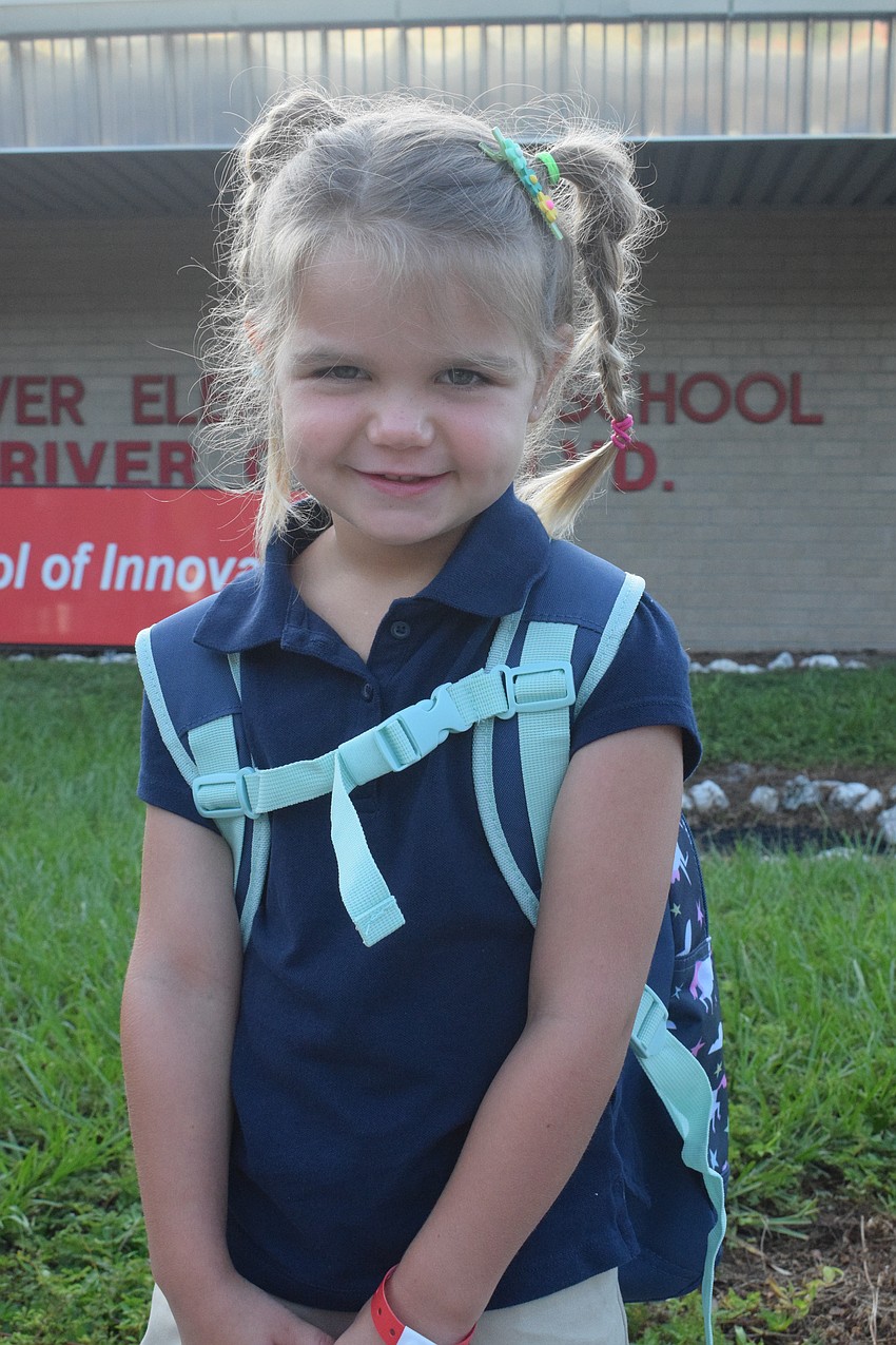 Harper Daspit, a pre-K student at Braden River Elementary School, can't wait to make friends while playing on the playground.