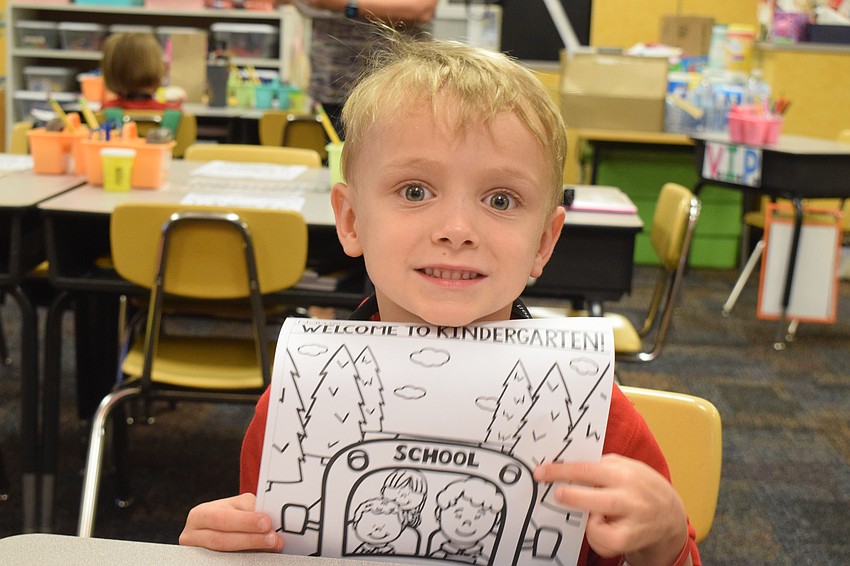 Asa Overton is thrilled for his first day of kindergarten at Braden River Elementary School. 