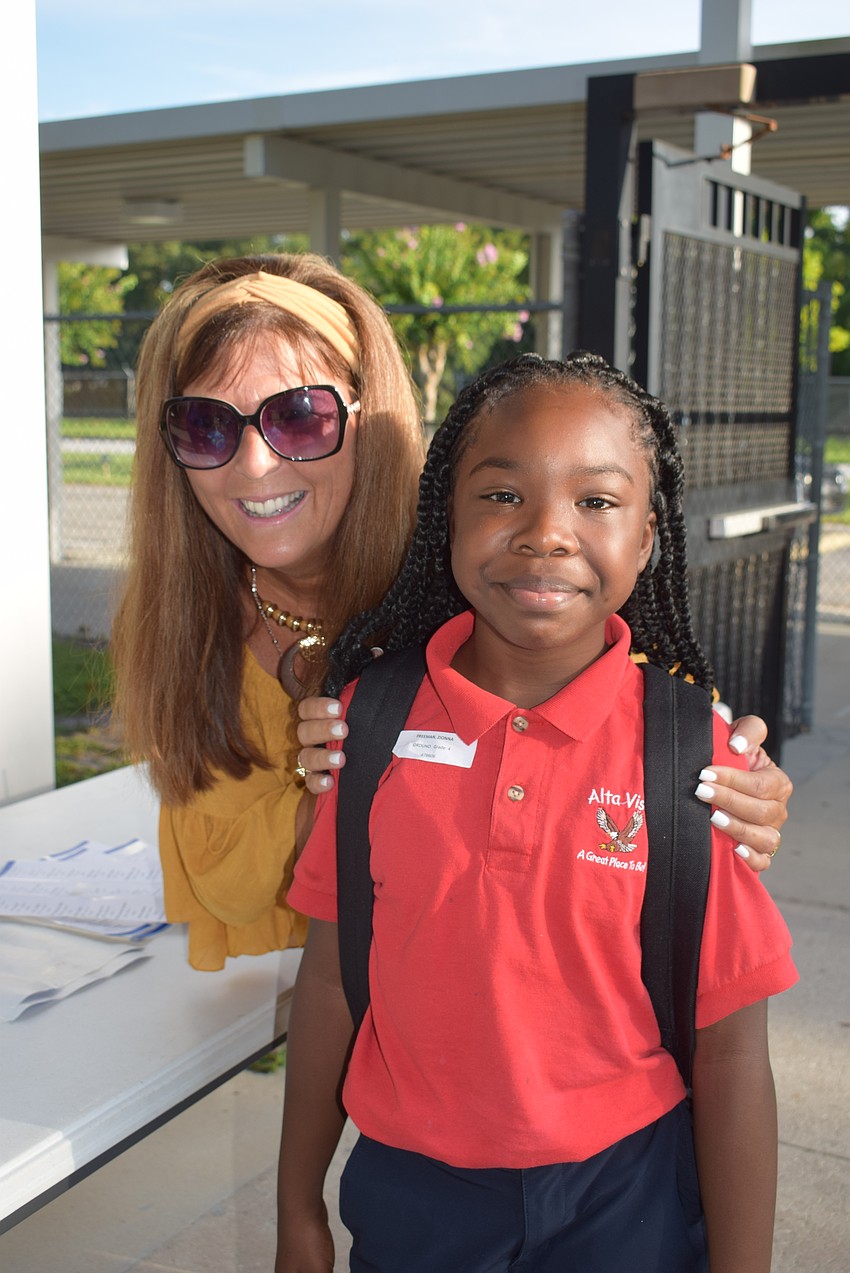 Bonnie Michaels and fourth grader Zionna Freeman
