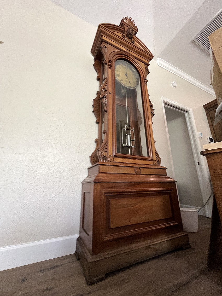 This grandfather clock has been in the Abrams family for generations. Angela Abrams says although the clock was damaged by flood waters, she will keep it.