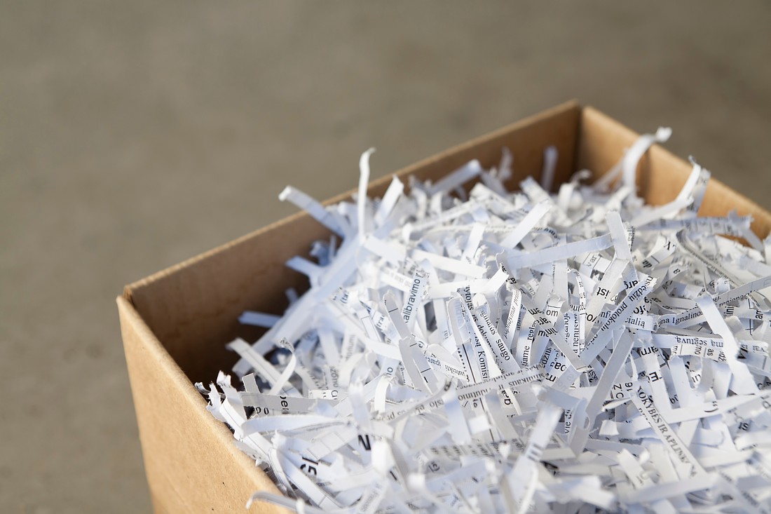 Close up of shredded waste paper strips