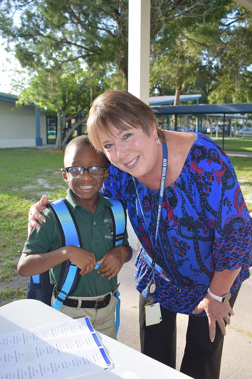 First grader Jhonson Jerre Francois and Amy Blyth