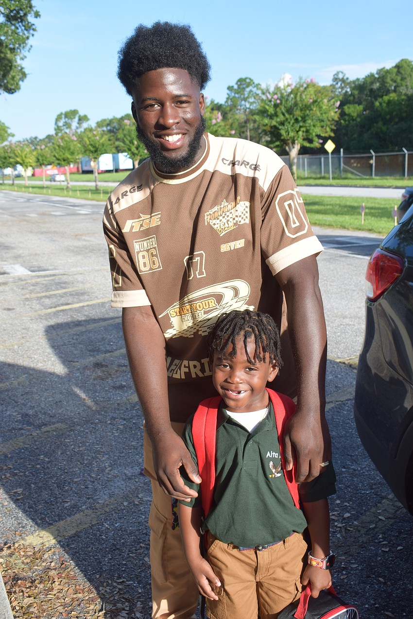 Shawn Cherry dropping off Royce Waiters