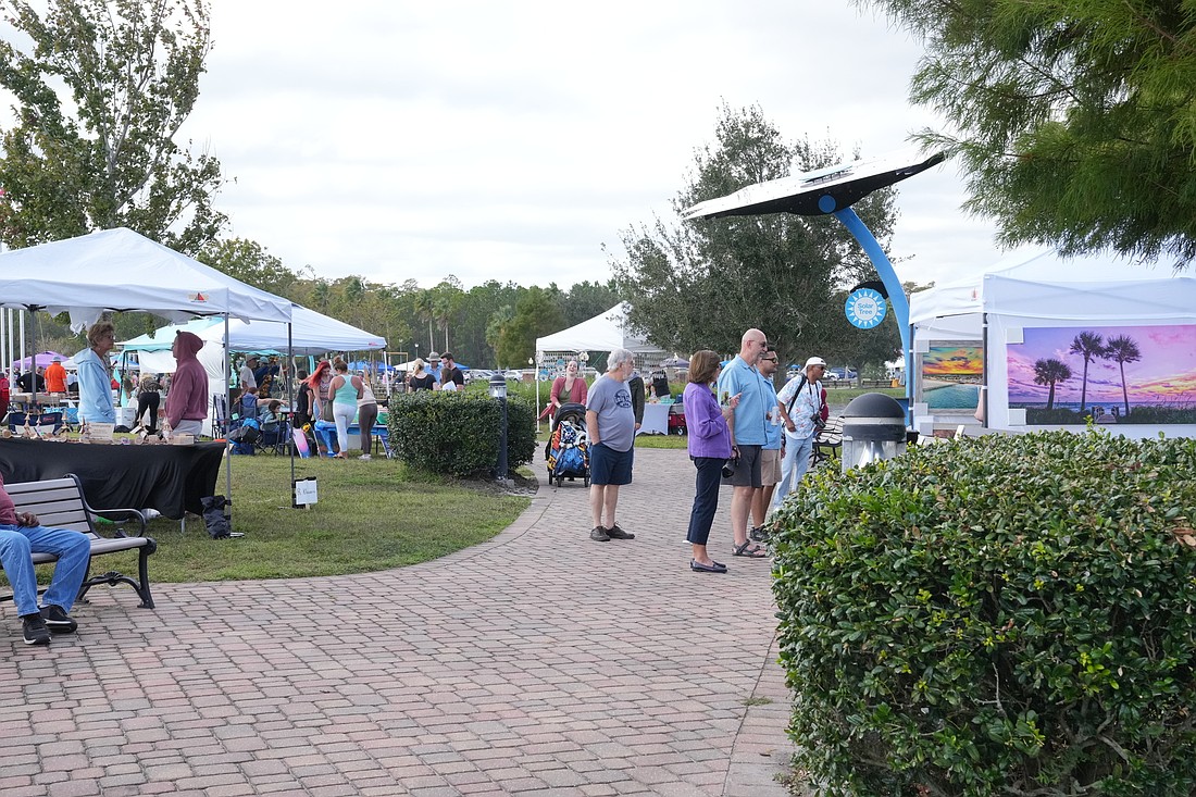 People peruse booths at the 2022 Palm Coast Fall Arts Festival. File photo by Danny Broadhurst