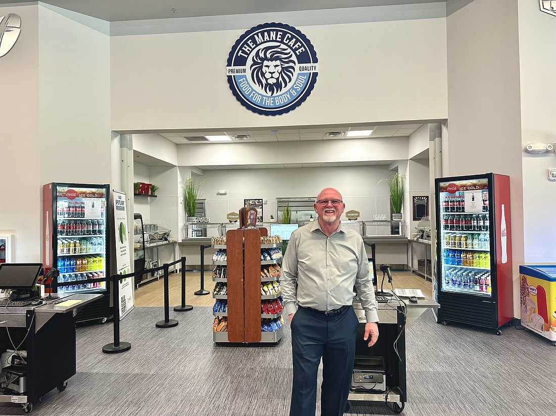 Foundation Academy President Dave Buckles stood in the new cafeteria and worship center known as The Mane.