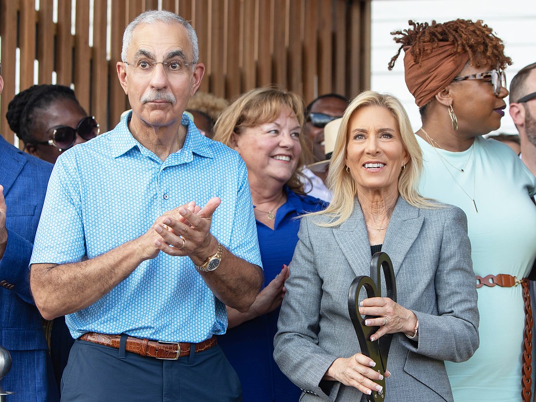 Jacksonville City Council member Ron Salem, left, and Mayor Donna Deegan are shown at the grand opening for Lift Ev’ry Voice and Sing Park on June 27. They are now squaring off over the city budget.