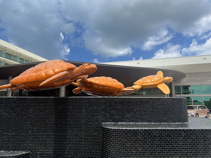 A sculpture of sea turtles greets guests of the St. Regis Longboat Key.