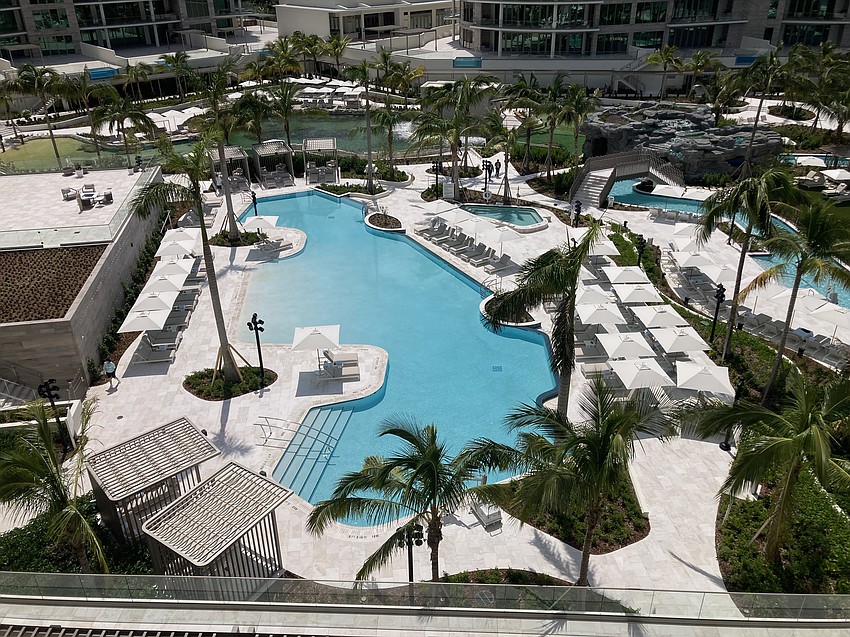Private cabanas are available for rent by the pool.