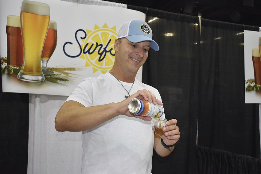 Steve Tucci pours a Surfside Iced Tea Vodka