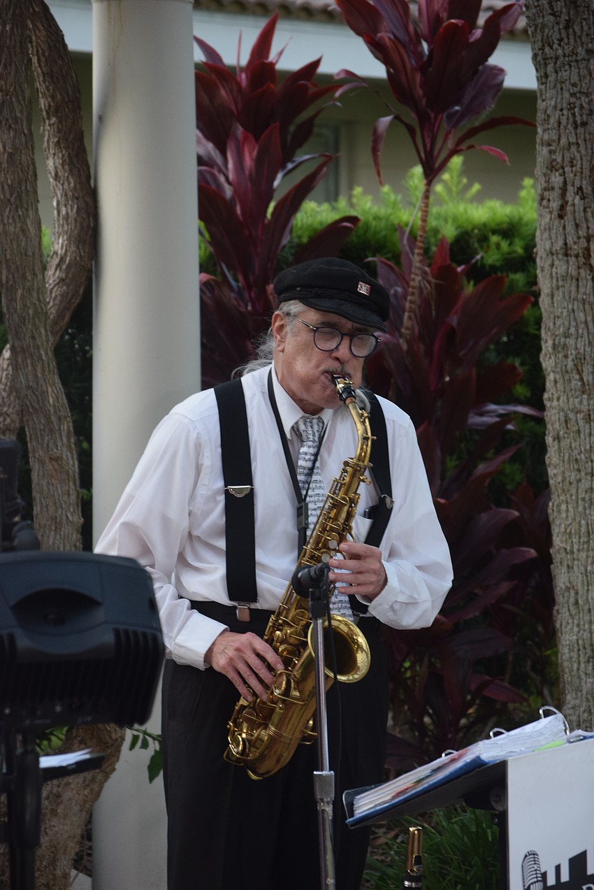 Wayne Pearson from the Jazz DaddyOs playing the alto saxophone.