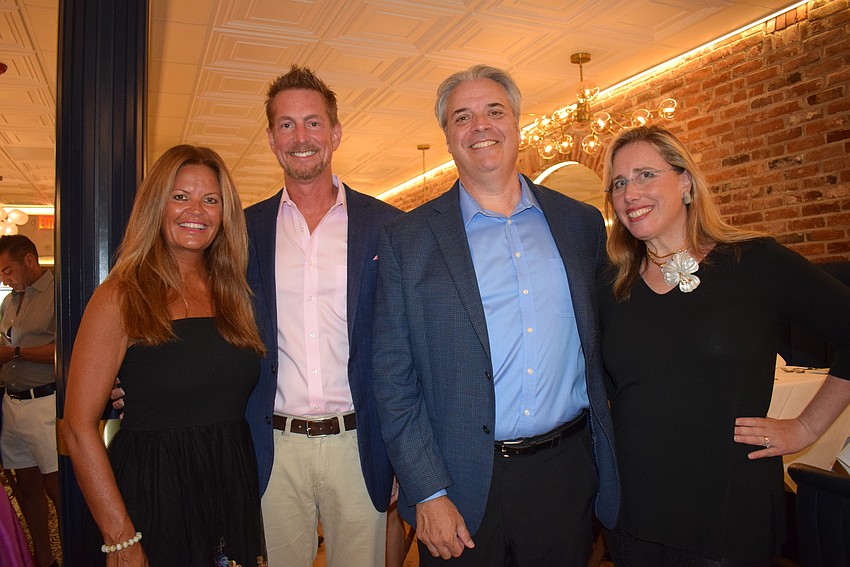 Cindy McGuire, Jason McGuire with President of Marie Selby Gardens Jennifer Rominiecki and her husband Rob.