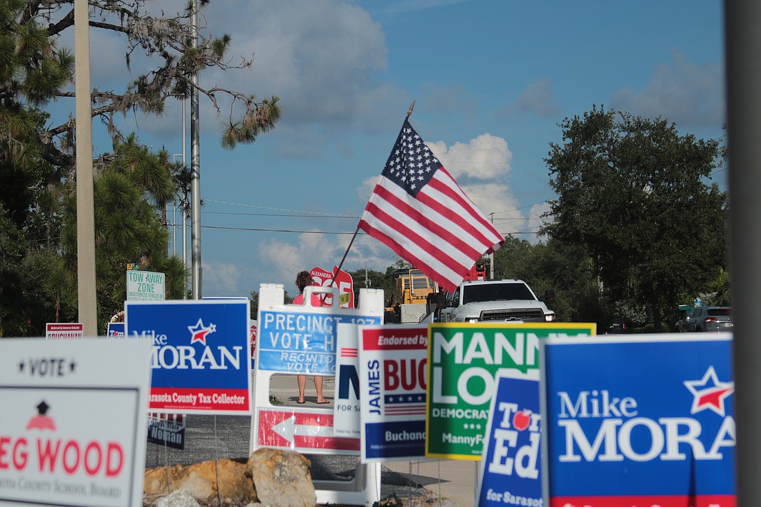 A forest of campaign signs fill the space along Fruitville Road at the polling place at the Knights of Columbus hall on Fruitville Road.