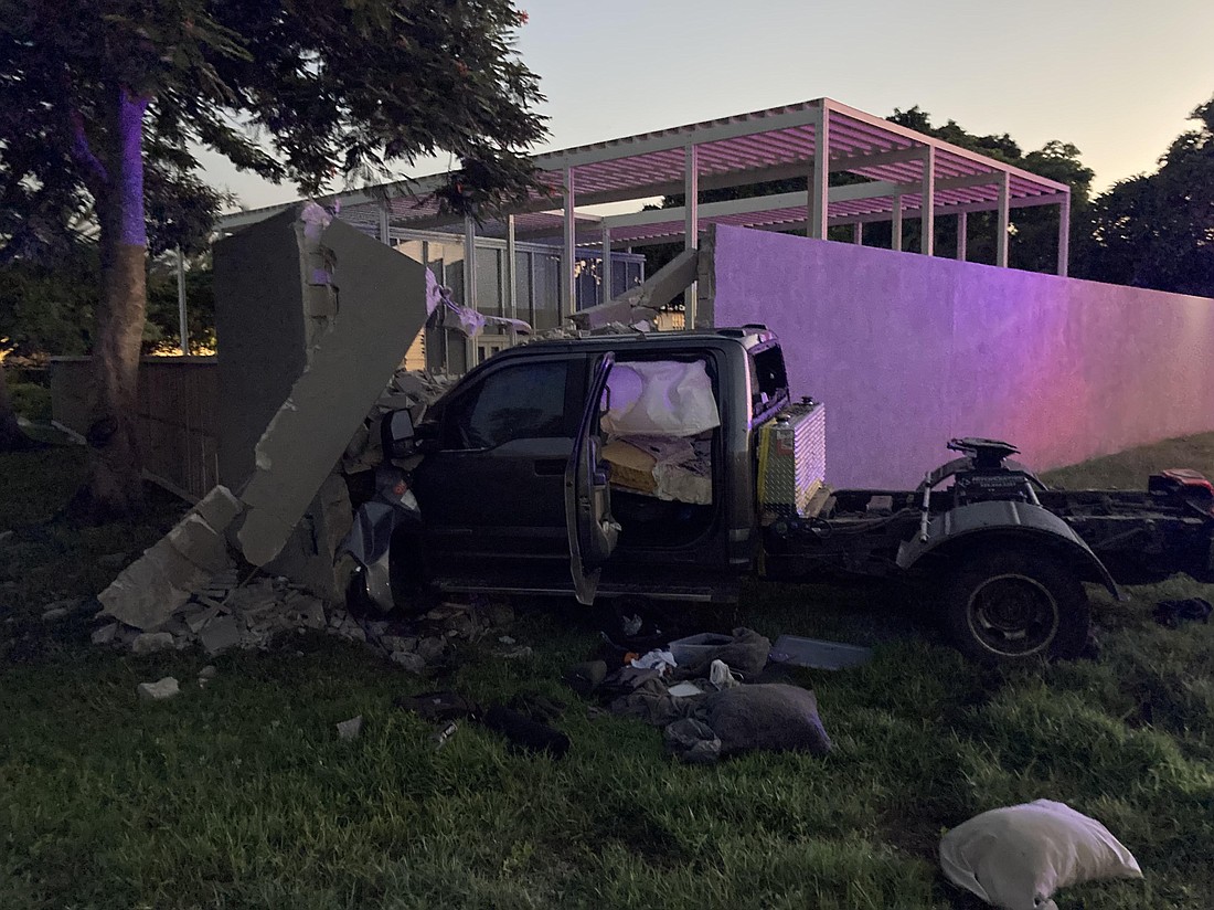 A truck was found by a Lido Shores homeowner after it crashed into their privacy wall. The driver apparently fled the scene, police say.