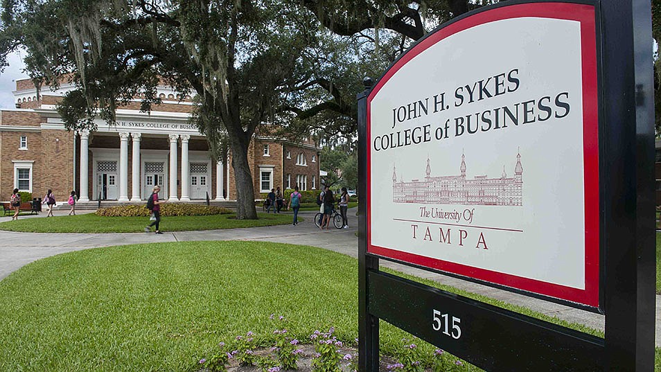 Signage for the College of Business at the University of Tampa.