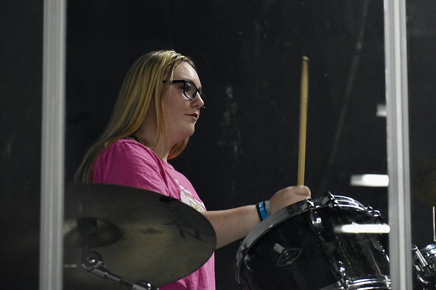 Sophia Emmons, 14, plays drums with The Heartbreakers.