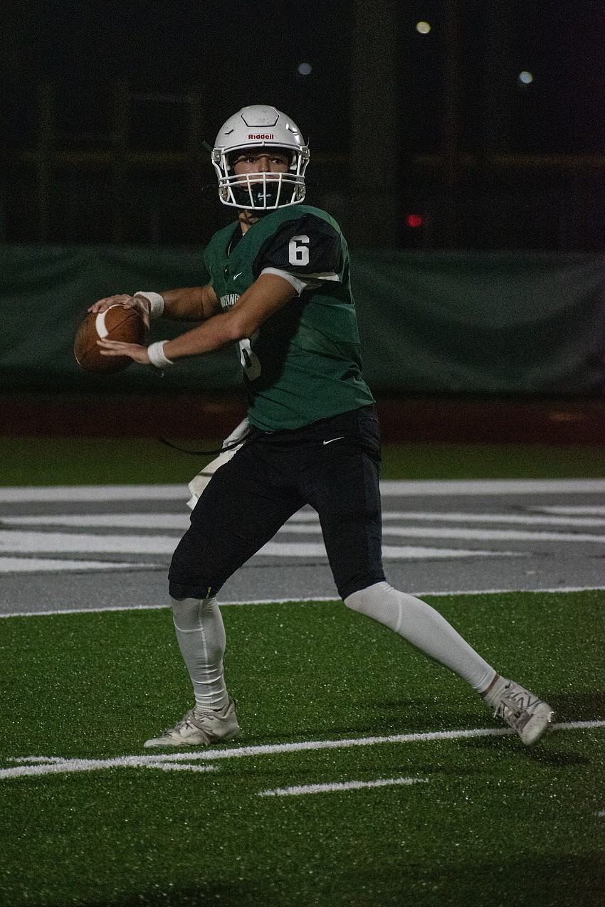 Lakewood Ranch junior quarterback Liam Fernandez looks for an open receiver against Lemon Bay High.