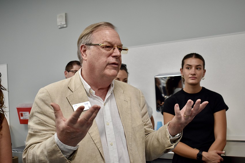 Kent Jimson, a Lakewood Ranch Business Alliance board member, has questions during the tour at LECOM.