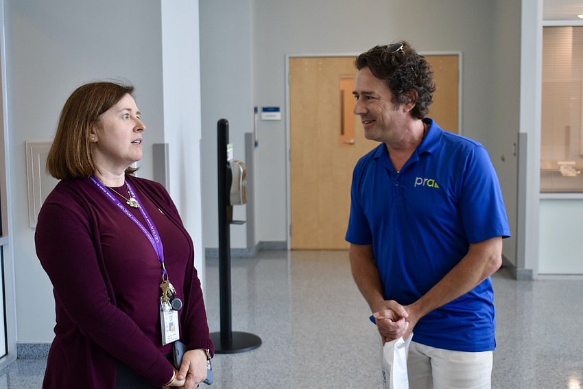 LECOM Director of Simulation Inessa Slipak speaks with Lakewood Ranch Business Alliance member John Holz. Holz is a partner at Plunkett Raysich Architects, the firm that designed the simulation lab.