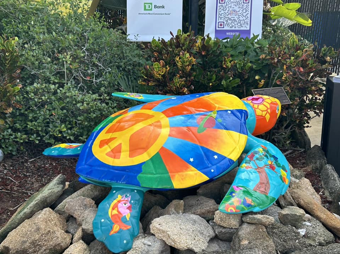 The new turtle trail sculpture, named MAX, is inspired by pop artist Peter Max and was created by local artist Sheryl Fletcher Coon. Courtesy of the Flagler County Cultural Council