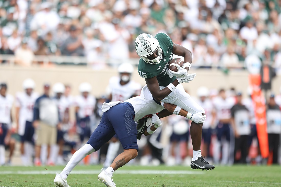 Former Riverview High wideout Jaron Glover, seen making a catch against Richmond University in 2023, is expected to be a starter for Michigan State University in 2024.