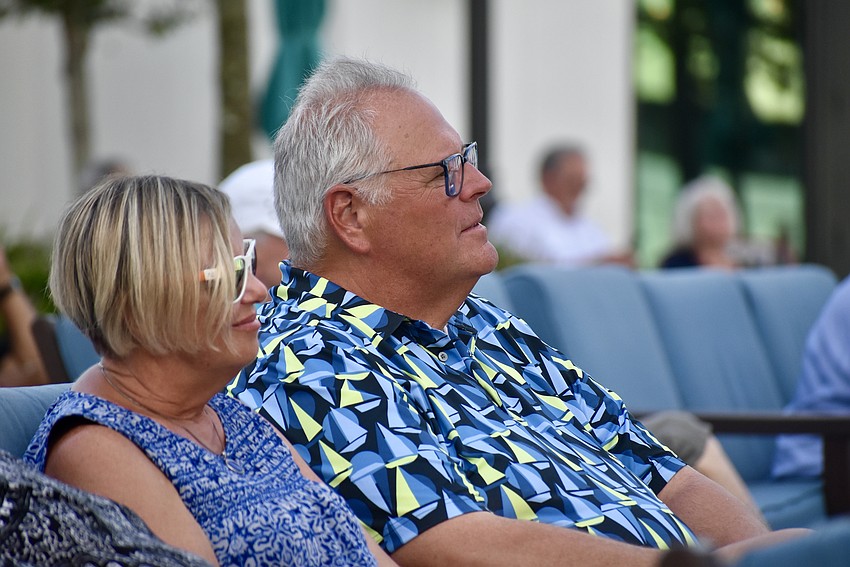 Lakewood Ranch residents Susan Batchelder and John Adamski enjoy the music at Waterside Place on Aug. 27.