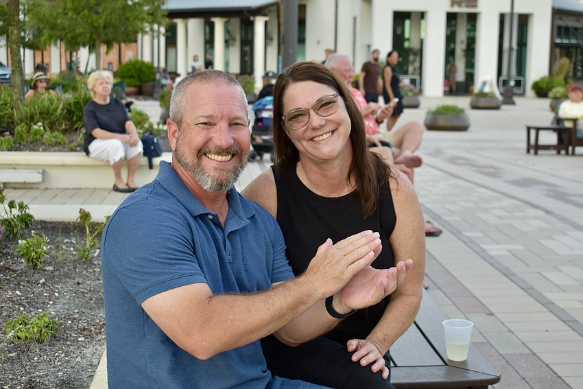 Lakewood Ranch residents Brian Moreland and Tracey Baron are in the audience to cheer for trumpet player Kristine Marsh.