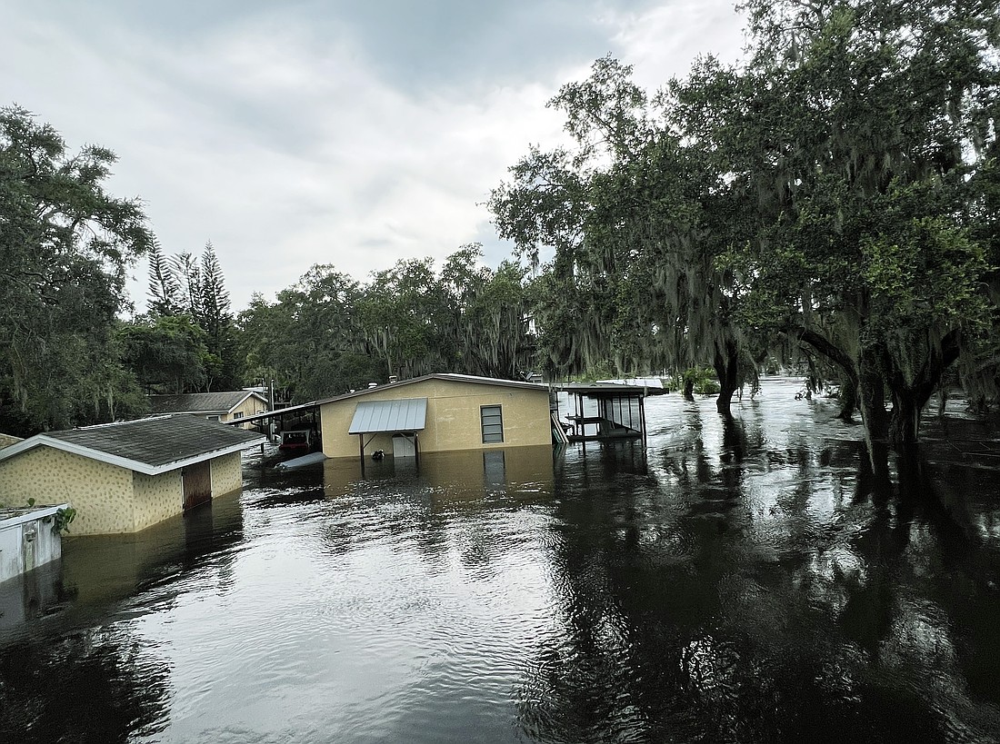 Just off the Legacy Trail north of Bahia Vista Street, the entire neighborhood was flooded from rain from Hurricane Debby.