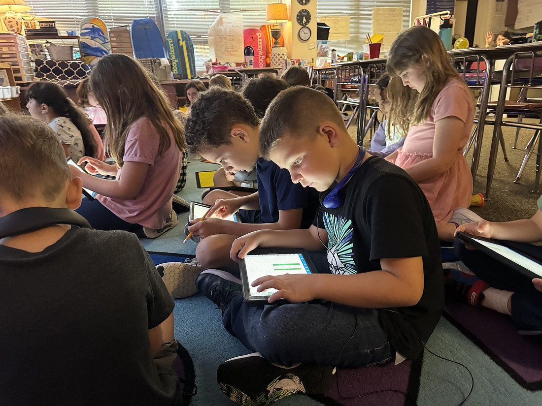 Students at Old Kings Elementary School work on their iPads. Photo courtesy of Flagler Schools