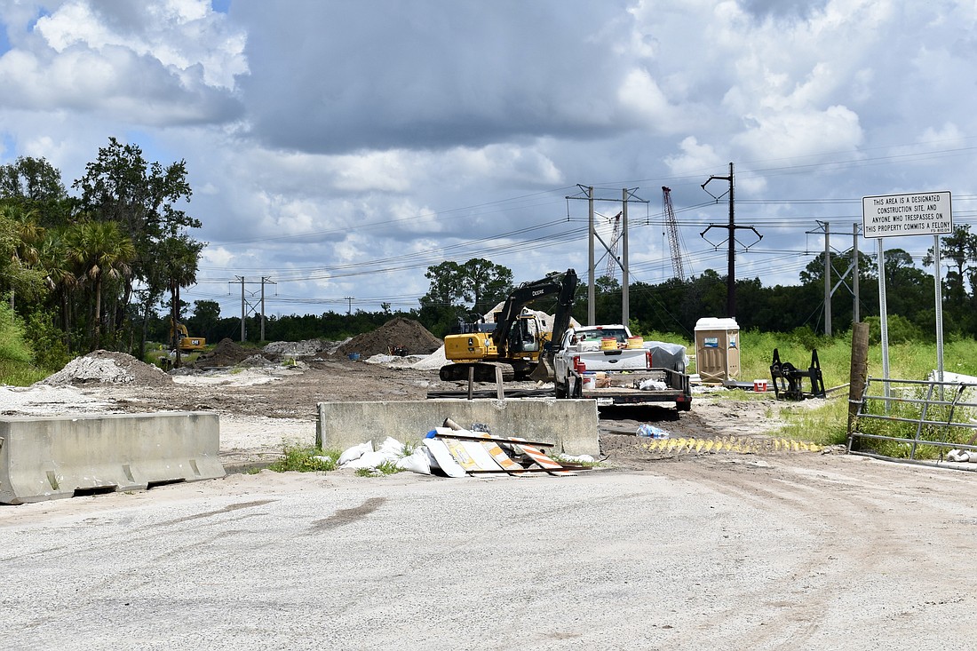 Construction is underway on Lena Road. This photo is taken at the end of the finished road heading from State Road 70.