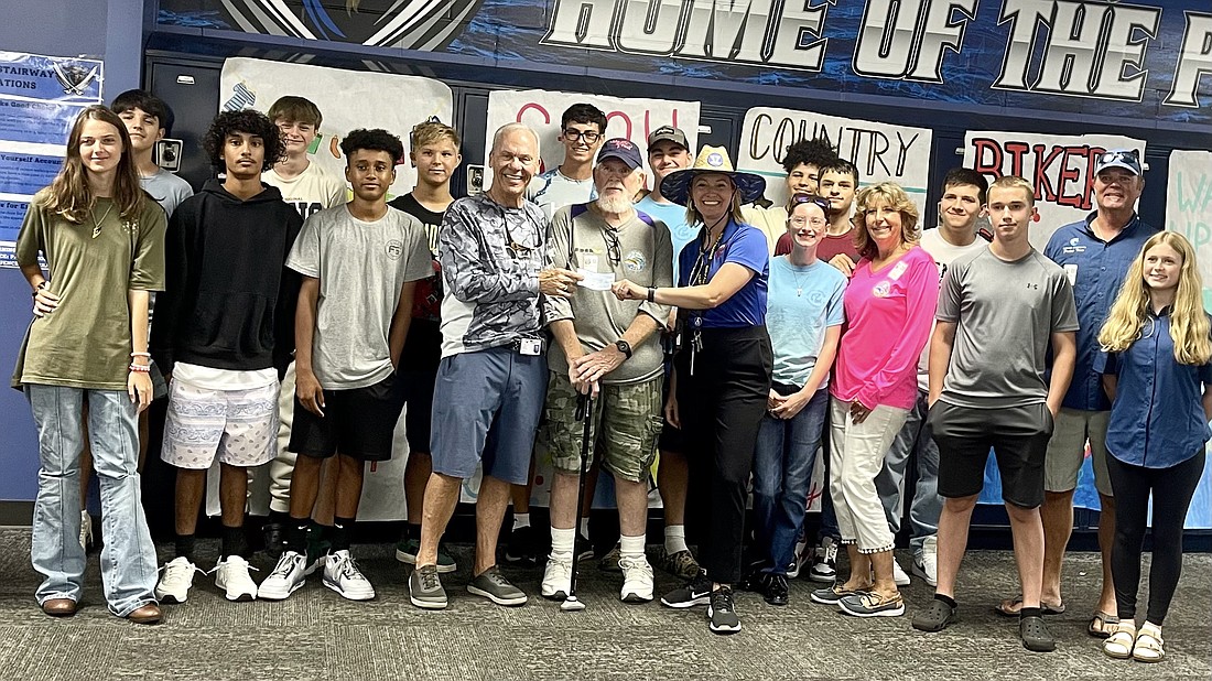 The Flagler Sportfishing Club awarded Matanzas High's Pirate Bounty Fishing Club with 40 new rods and reels and $750 for club expenses. Courtesy photo