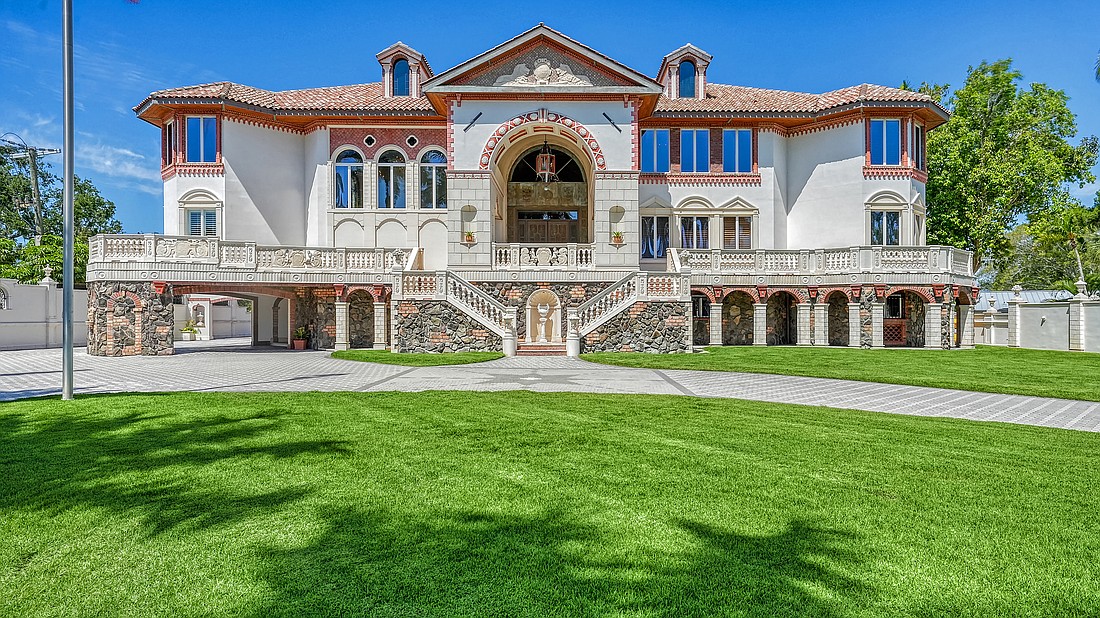 A more than 9,000-square-foot home with frontage on Little Sarasota Bay features Italian-inspired touches.