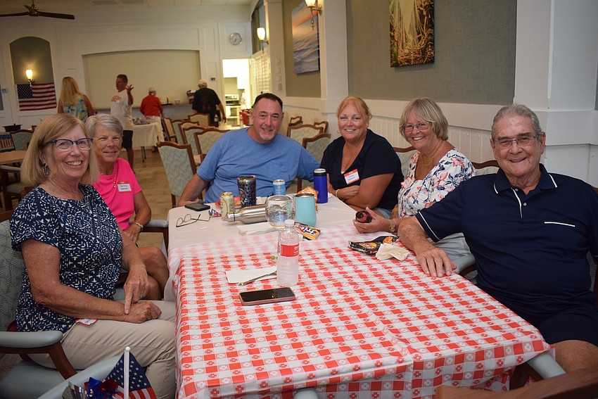 Barbara Bellamente, Darlene Sedlock, George Holtzer, JoAnn Holtzer, Christina Filkins and Ken Comeforo at Longboat Harbour's Labor Day party.
