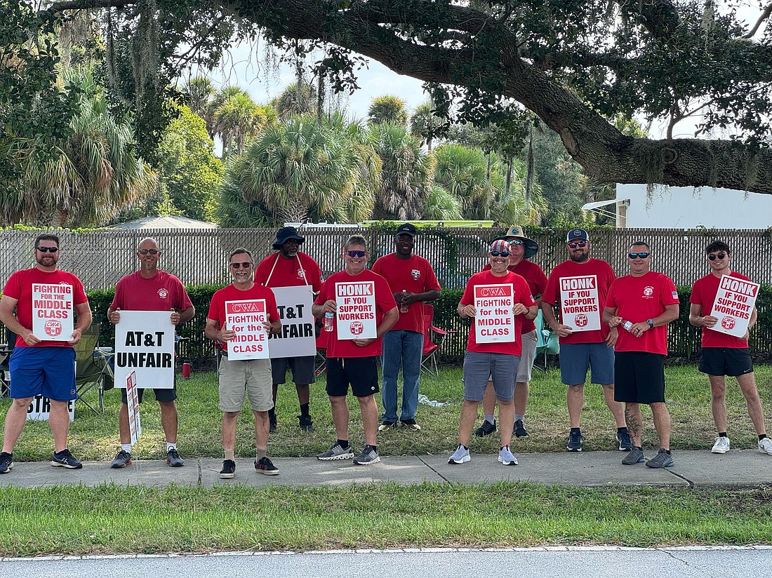 CWA Local 3102 chapter union members are on strike at 5 Clubhouse Drive in Palm Coast. Courtesy of the CWA 3102 chapter