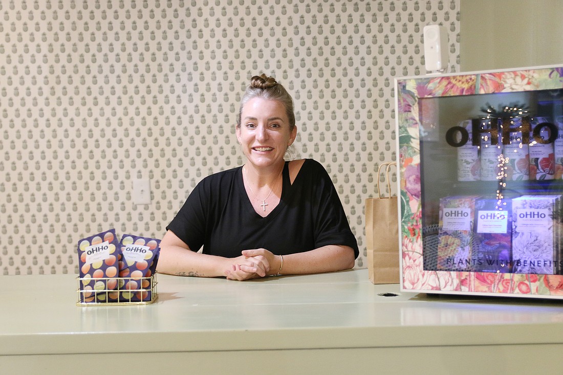 Erin Alvalle is oftentimes found behind the counter, waiting to greet new customers. Photo by Jarleene Almenas