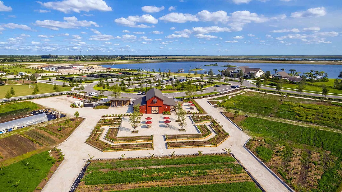 Freehold Communities “Agrihood” Arden master-planned development in South Florida features a 5-acre farm and event barn.