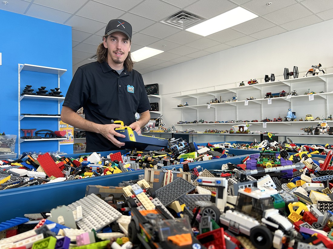 Jackson Wagner and his father, John, own the Bricks & Minifigs store at 4004 S. Third St. in the South Beach Regional shopping center.