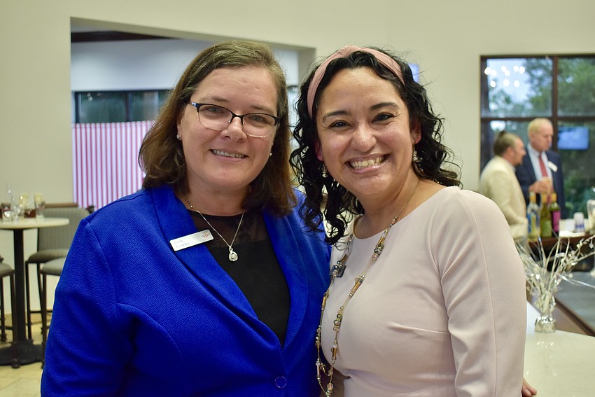 Consumer Bank Market Leader Dana Proshka and Financial Center Manager Sagrario Weatherly attend the grantee celebration at Gold Coast Eagle Distributing on Sept. 4.